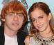 Emma Watson, très minouche, entre Rupert Grint et Daniel Radcliffe, lors du photocall de "Harry Potter et le Prince de Sang-Mêlé", au Claridge Hotel de Londres, le 6 juillet 2009 !