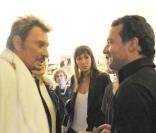 Johnny Hallyday, sa fille Laura Smet et le compagnon de celle-ci, Julien Delajoux lors du concert du 29 mai 2009 au Stade de France 