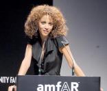Noémie Lenoir au gala de l'amfAR organisé dans le cadre de la Fashion Week milanaise. 28/09/09