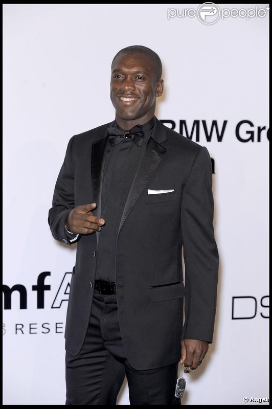 Clarence Seedorf est venu accompagné de sa femme Luviana au gala de l'amfAR organisé dans le cadre de la Fashion Week milanaise. 28/09/09