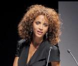 Noémie Lenoir au gala de l'amfAR organisé dans le cadre de la Fashion Week milanaise. 28/09/09