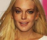 Lindsay Lohan  lors du défilé d'Emanuel Ungaro pour la semaine de la mode printemps-été 2010 à Paris, en octobre 2010 