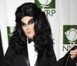 Michael Kors, créateur et ami de Heidi Klum : regard félin et costume de pingouin ! (2007) 