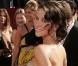 Evangeline Lilly les cheveux délicatement relevés. Elle charme tout le monde... 