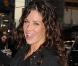 Evangeline Lilly en pleine promo opte pour un jean simple et un trench noir : le must !