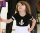 Suri Cruise s'impatiente : Maman l'a habillée en total Ralph Lauren, mais il lui manque un sac ! (Brésil, 3 février 2009)