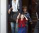 Suri, total lokée : un cardigan signé Juicy Couture et des ballerines Nordtrom. La classe ! (22 mars 2009, Los Angeles)