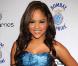 La chanteuse Kat de Luna portait une robe bleue pas vraiment élégante mais son charmant sourire faisait vite oublié ce fashion faux-pas lors du lancement du livre About Face de Scott Barnes à l'Hôtel Provocateur à New York le 20 janvier 2010 