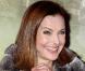 Carole Bouquet fait le grand écart... Encore !