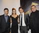 Les acteurs du jeu, Sam Douglas, Jacqui Ainsley, Leon Eckenden et Pascal Langdale prennent la pose à l'avant-première du jeu vidéo Heavy Rain de Sony pour la PS3 au cinéma Marignan des Champs Elysées à Paris le 16 février 2010
