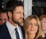 Le séduisant Gerard Butler et la très belle Jennifer Aniston à l\'occasion de l\'avant-première américaine de<i> The Bounty Hunter, le chasseur de primes</i>, qui s\'est tenue au Ziegfeld Theatre, à New York, le 16 mars 2010.