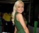 La belle playmate Holly Madison tout de vert vêtue à l'occasion de la Saint-Patrick, au O'shea's Casino de Las Vegas, le 17 mars 2010.