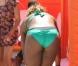 Serena Williams porte un maillot de bain vert émeraude à dentelle alors qu'elle bronze sur la plage de South Beach à Miami le 2 avril 2010