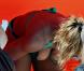 Serena Williams porte un maillot de bain vert émeraude à dentelle alors qu'elle bronze sur la plage de South Beach à Miami le 2 avril 2010