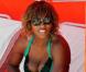 Serena Williams porte un maillot de bain vert émeraude à dentelle alors qu'elle bronze sur la plage de South Beach à Miami le 2 avril 2010