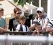 La star du football, actuellement blessée au pied, et sa petite tribu - Brooklyn, 11ans, Romeo, 7 ans et demi, et Cruz, 5 ans - ont admiré le show des Jonas Brothers du haut d'une petite terrasse...