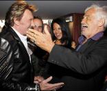 Jean-Paul Belmondo et Barbara Gandolfi au 67e anniversaire de Johnny Hallyday, le 15 juin 2010.