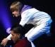 Justin Bieber se produit, mardi 20 juillet, sur la scène du Nokia Theatre de Los Angeles, devant plus de 7 000 fans.