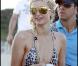 Paris Hilton et sa soeur Nicky se pavanent sur la plage de Pampelone, à Saint-Tropez, le 24 juillet 2010.