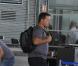 Le rubgyman français Christian Califano se prépare à embarquer pour l'aventure Pékin Express, à l'aéroport de Roissy, le 30 juillet 2010