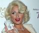 Paris Hilton transformée en Marilyn Monroe pour la soirée de lancement de sa 10e fragance Tease dans la boîte de nuit MyStudio à Hollywood le 10 août 2010