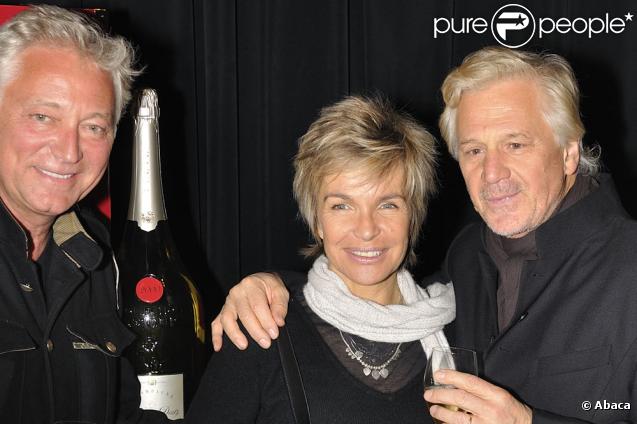 Véronique Jannot et Gérard Lenorman lors de la soirée de lancement du champagne mathusalem Amour de Deutz 2002 créé par Christofle et présenté à Paris le 21 octobre 2010 