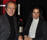 Christian Morin et une amie lors de la soirée de lancement du champagne mathusalem Amour de Deutz 2002 créé par Christofle et présenté à Paris le 21 octobre 2010 
