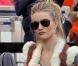 Rosie Huntington-Whiteley sur le tournage de Safe , dans le quartier de Chinatown, à New York, en octobre 2010.