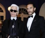 Jake Davies et Karl Lagerfeld à la soirée de lancement du calendrier Pirelli 2011. Moscou