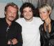 Johnny Hallyday et Laeticia auprès de Mathieu Chedid après son concert à L'Olympia, le 27 mai 2010