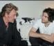 Johnny Hallyday auprès de Mathieu Chedid après son concert à L'Olympia, le 27 mai 2010