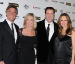 John Easterling, Olivia Newton-John, John Travolta et Kelly Preston lors du gala G'Day Black Tie à Hollywood le 22 janvier 2011
