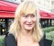 Julie Ferrier, lors de son arrivée au Fouquet's, sur les Champs-Elysées, à Paris, pour le déjeuner des nominés des César 2011, le 5 février 2011.