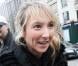 Audrey Lamy, lors de son arrivée au Fouquet's, sur les Champs-Elysées, à Paris, pour le déjeuner des nominés des César 2011, le 5 février 2011.