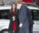 Le prince William et Kate Middleton, accompagnés du prince Harry, signent le livre de condoléances à la mémoire des victimes du tremblement de terre survenu en Nouvelle-Zélande, le 25 février 2011, à Londres.