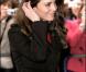 Le prince William et Kate Middleton, accompagnés du prince Harry,  signent le livre de condoléances à la mémoire des victimes du  tremblement de terre survenu en Nouvelle-Zélande, le 25 février 2011, à  Londres.