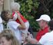 Boris Becker, sa femme Lily, leur fils Amadeus et le petit Elias Becker, sur la plage à Miami, le 7 mars 2011