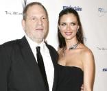 Georgina Chapman et son époux Harvey Weinstein, sur tapis rouge. Janvier 2011 
