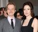 Gary Oldman et sa femme Alex Edenborough lors des Jameson Empire Film Awards, au Grosvenor House Hotel, à Londres, le 27 mars 2011.