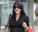 Selma Blair tout sourire en robe portefeuille et talons. Une femme enceinte qui a de l'allure et que ne néglige pas sa féminité ! 