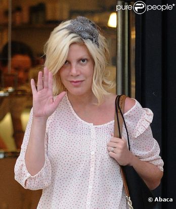 Tori Spelling avec son mari Dean McDermott chez Barney's, le 7 mai 2011. Los Angeles.