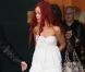  Rihanna porte une robe bustier blanche en coton... Très estival ! Paris, 6 mai 2011 