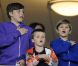Romeo, Brooklyn et Cruz, la main sur le coeur, suivent l'hymne afin de soutenir leur papa David Beckham lors du match opposant les LA Galaxy au Portland Timbers  au Depot Center de Los Angeles le 23 avril 2011
