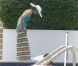 Katie Holmes et la petite Suri s'amusent dans la piscine d'un hôtel de Miami le 16 mai 2011
