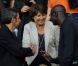Martine Aubry salue Lilian Thuram et Michel Cymès au match PSG-Lille, dans le cadre de la 37e journée de Ligue 1 au Parc des Princes (Paris), samedi 21 mai 2011.