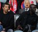 Lilian Thuram et Michel Cymès assistent au match PSG-Lille, dans le cadre de la 37e journée de Ligue 1 au Parc des Princes (Paris), samedi 21 mai 2011.