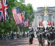 Barack et Michelle Obama sont attendus à Buckingham Palace à Londres, le 24 mai 2011.