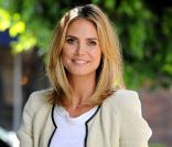 Heidi Klum à la sortie d'un shooting pour AOL le 31 mai 2011 à Los Angeles avec un look au top