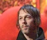 Oasis en 2007 lors des Brit Awards, Zak Starkeysur la droite