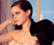 Emma Watson, sur des clichés extraits de la vidéo making-of de la publicité Midnight Rose